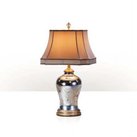 A silvered and hand painted verre églomisé table lamp