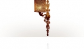 A verdigris brass single light wall lamp / sconce